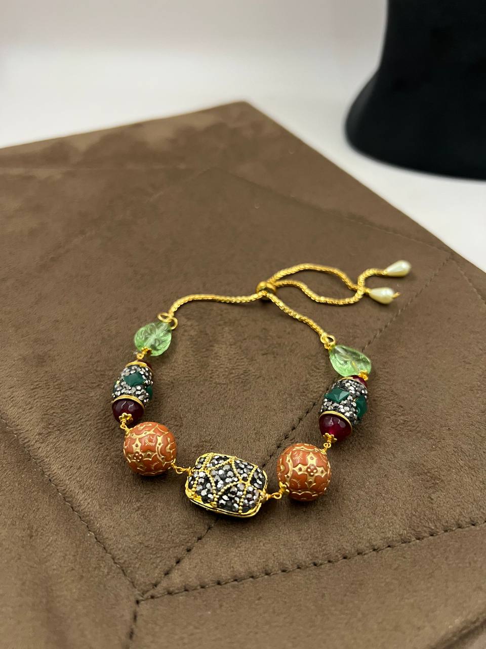 Nazakat Orange Carved Beads Jadau Bracelet Adjustable