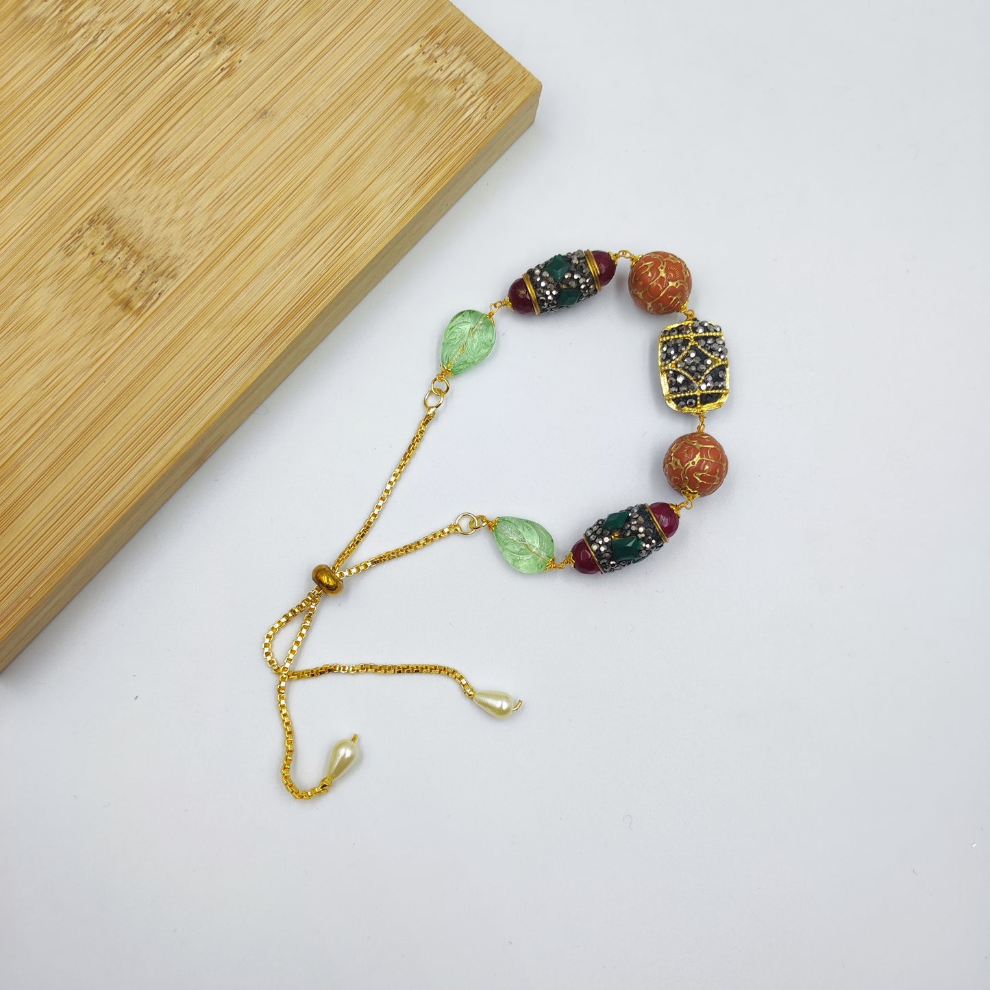 Nazakat Orange Carved Beads Jadau Bracelet Adjustable
