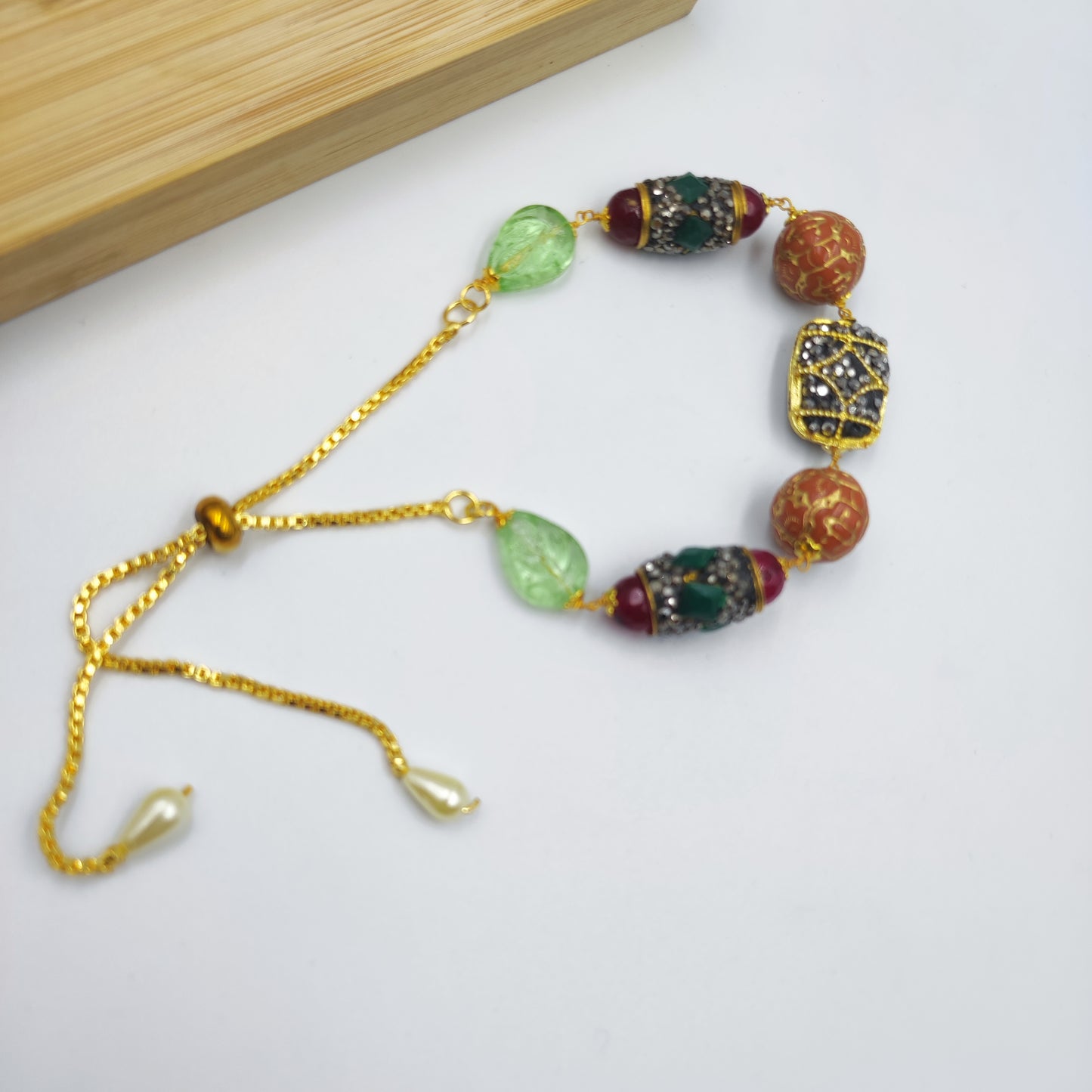 Nazakat Orange Carved Beads Jadau Bracelet Adjustable