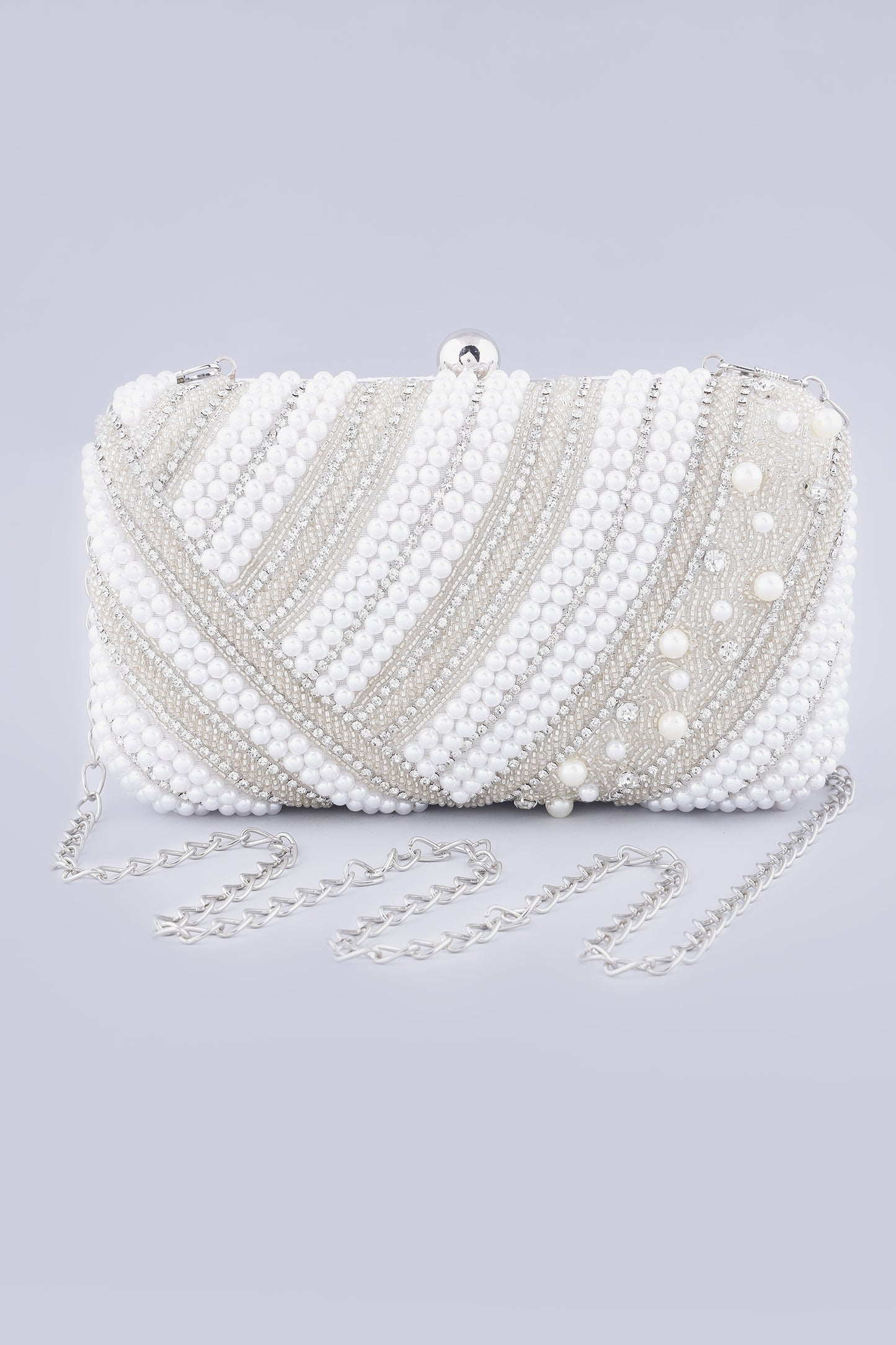 Naisha pearl white silver clutch