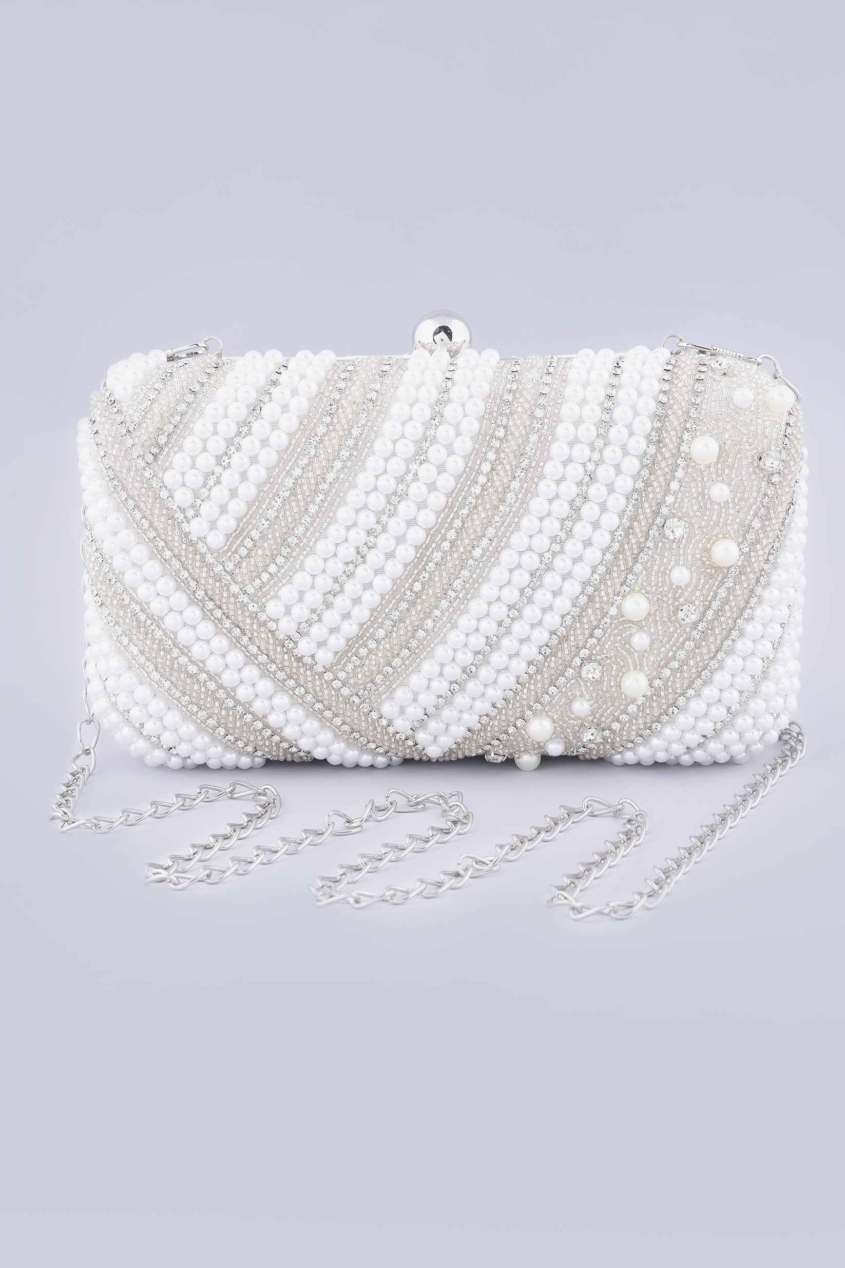 Naisha pearl white silver clutch